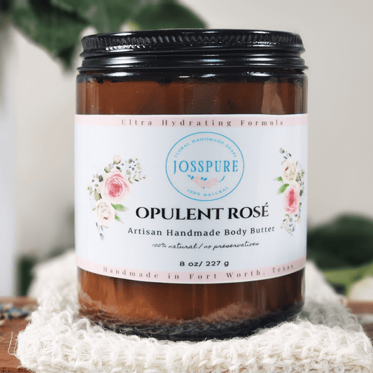 JOSSPURE rose mango butter whipped body butter in brown jar with black lid and floral label