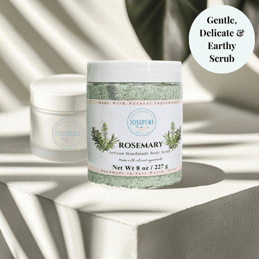 JOSSPURE rosemary sugar scrub in clear jar with white lid and natural body care label on stone surface