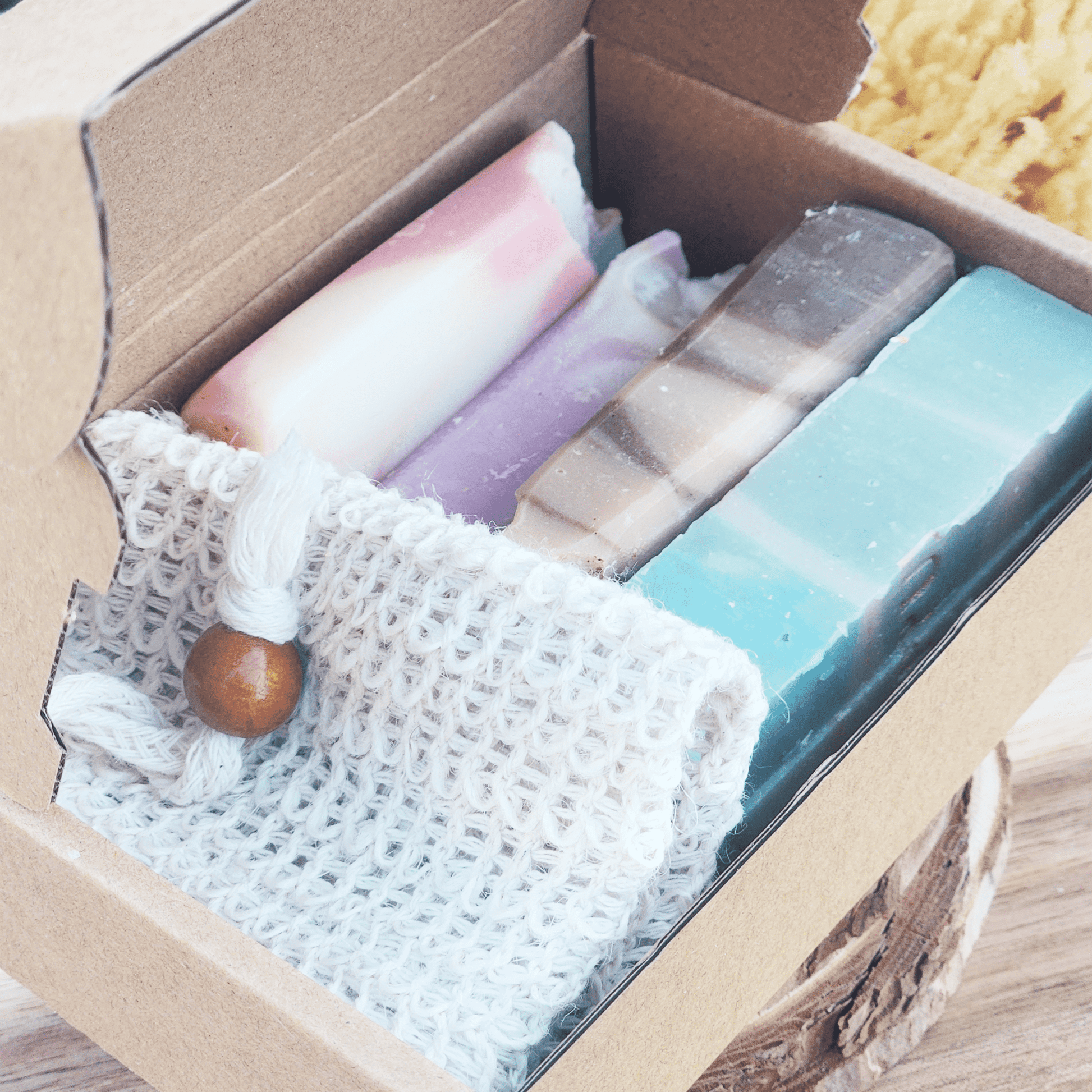 JOSSPURE Soap Sampler Gift Set Shea Butter Soap with four colorful handmade natural soap bars in a cardboard box