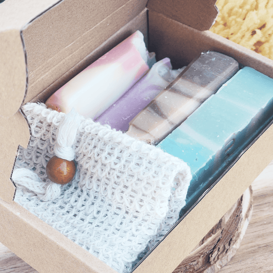 JOSSPURE Soap Sampler Gift Set Shea Butter Soap with four colorful handmade natural soap bars in a cardboard box